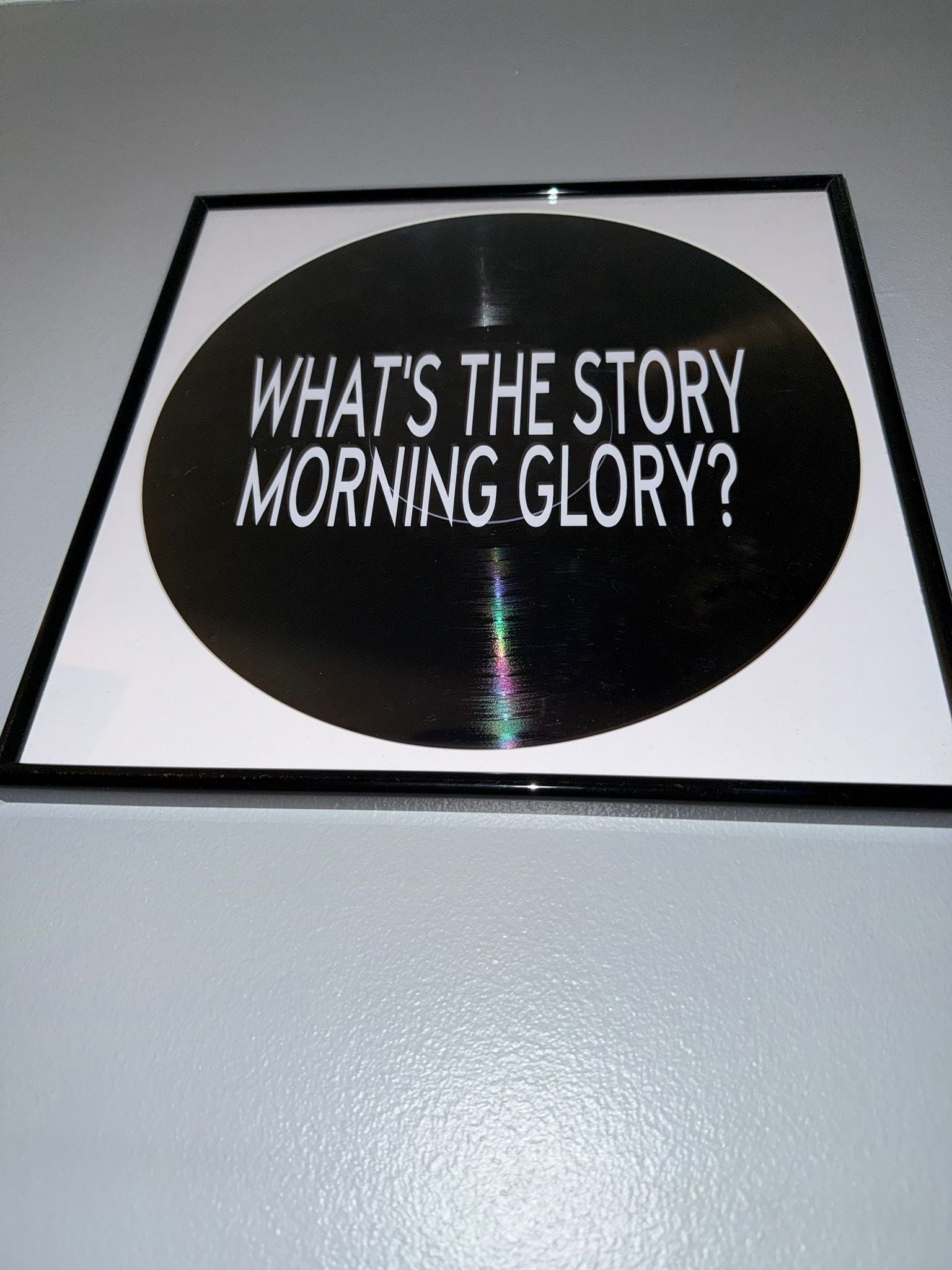 98) Oasis Framed Vinyl Art 12”