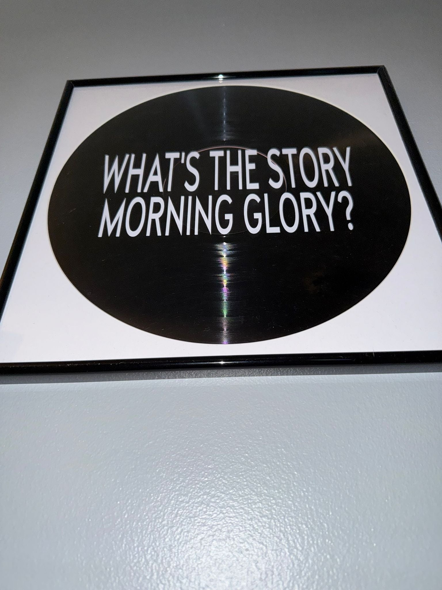 99) Oasis Framed Vinyl Art 12”