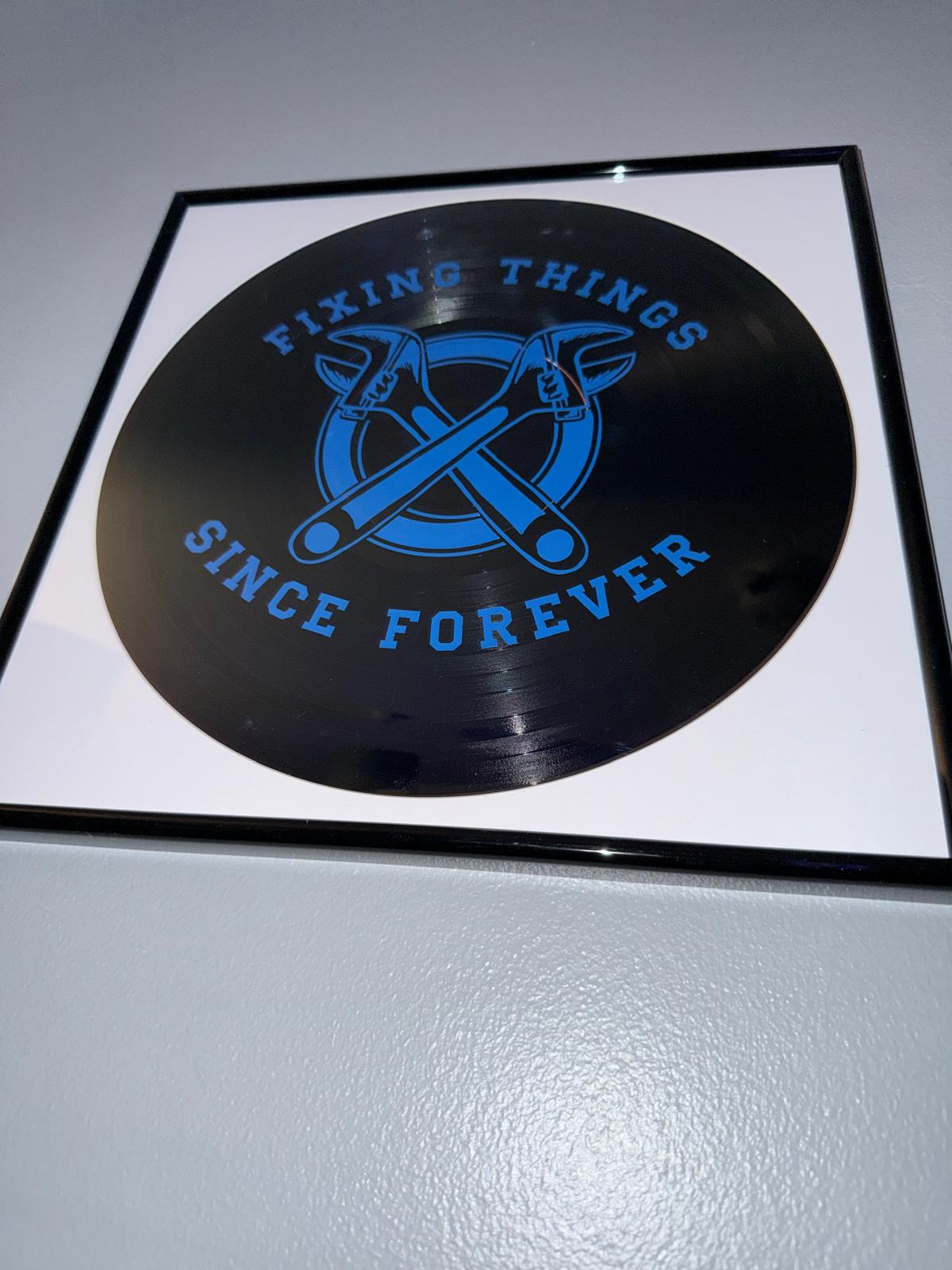 134) Fixing Things Framed Vinyl Art 12”