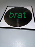 136) Brat Framed Vinyl Art 12”